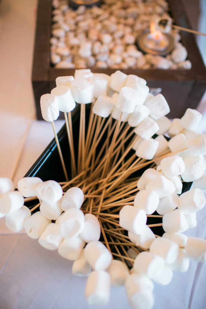 Fun idea for wedding, marshmallows on a stick for roasting.