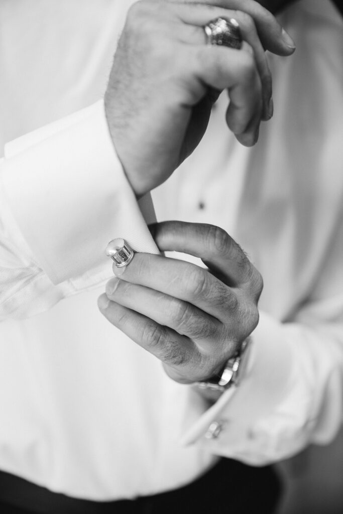 Grooms cufflinks at Airlie Gardens.