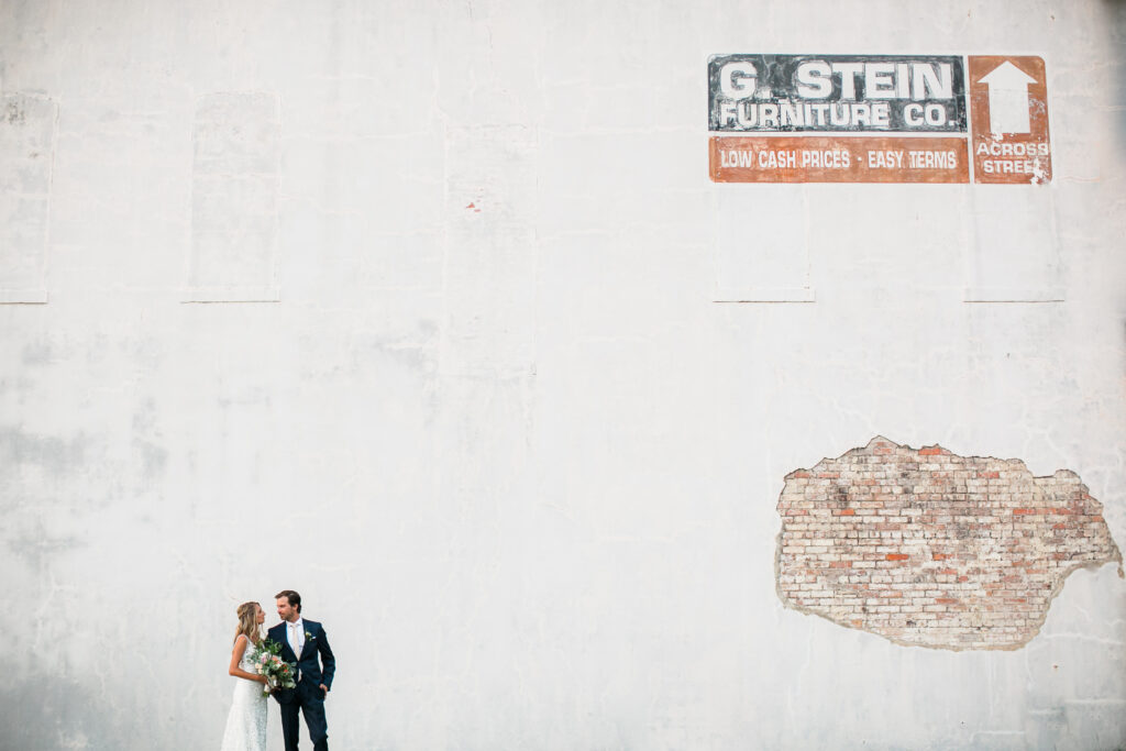 Newly married couple take a quiet moment for photography after their wedding.