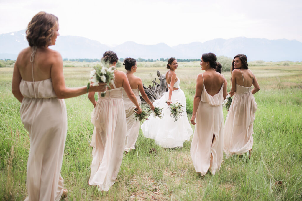 Bride and bridesmaids walk together during a Lake Tahoe Wedding.