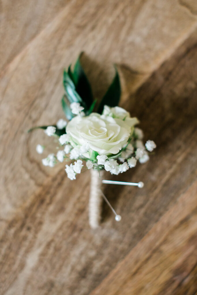 White and green boutonniere at a Wrightsville Manor wedding.