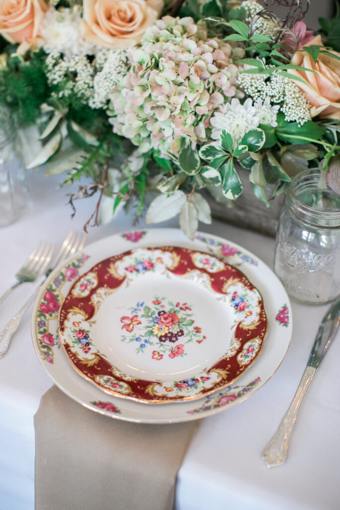 Antique plate used in table setting at the Wrightsville Manor for a wedding in Wilmington NC.