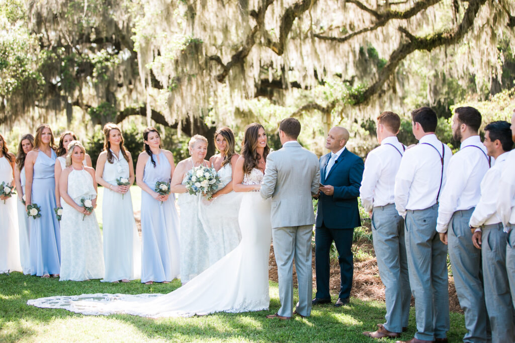 Wedding ceremony under Airlie Oak in Airlie Gardens.