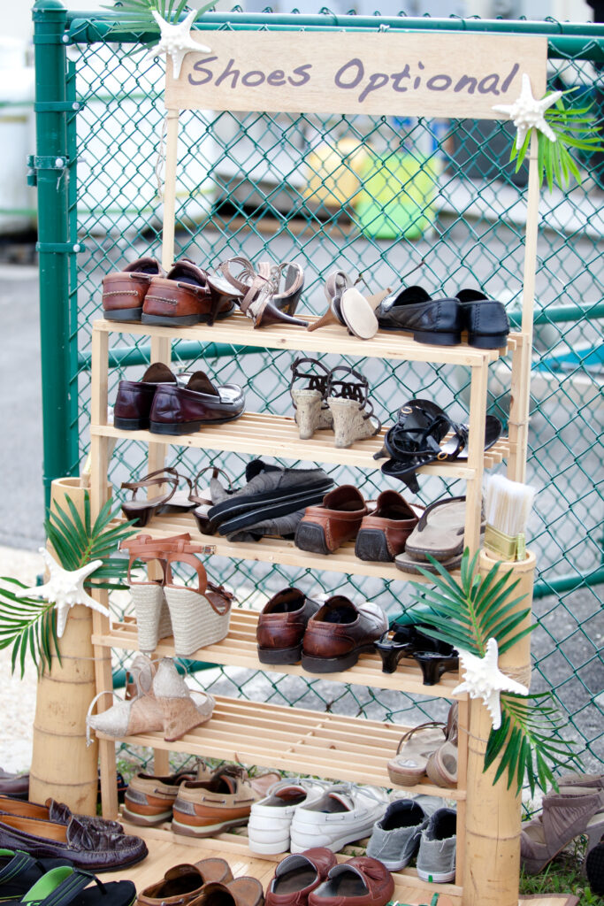 Shoes optional sign at Shell Island Resort for a wedding.