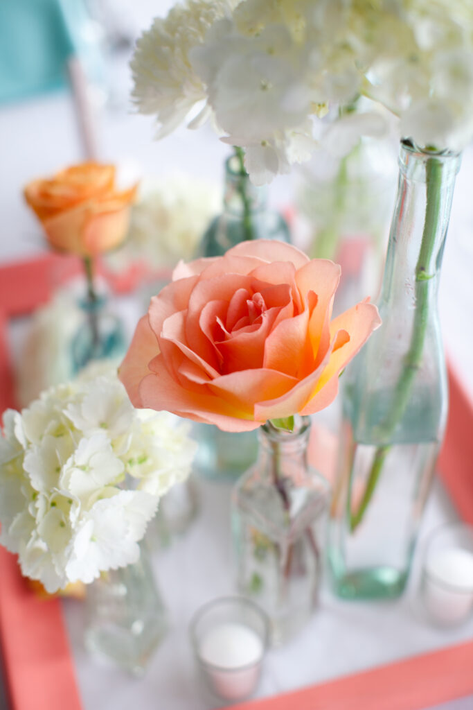 Peach colored flower on table of Shell Island Resort reception